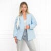 Megan jasje lichtblauw met motief en steekzakken.