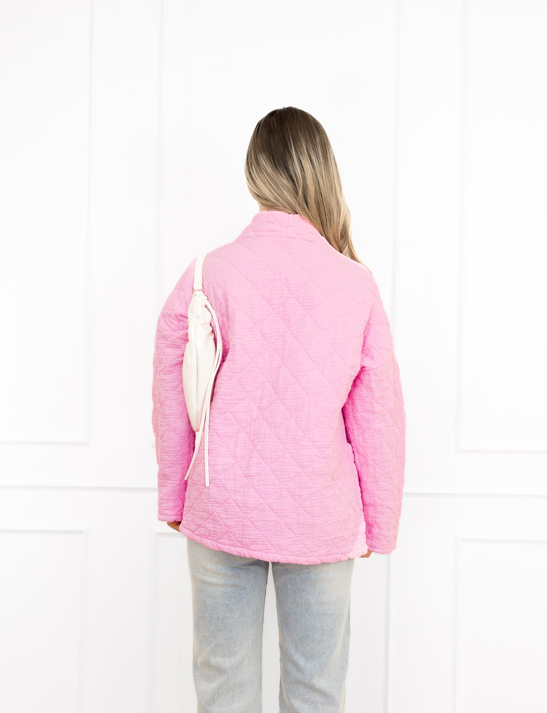 Megan jasje roze met motief en steekzakken.