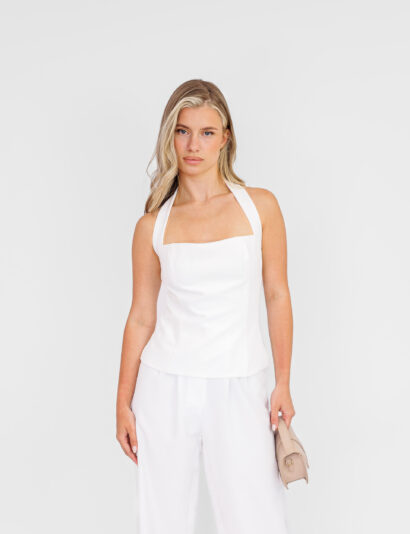 Dames haltertop met aangesloten pasvorm en zijsrits, gecombineerd met bijpassende pantalon