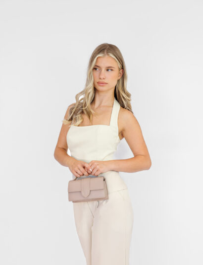 Dames haltertop met aangesloten pasvorm en zijsrits, gecombineerd met bijpassende pantalon